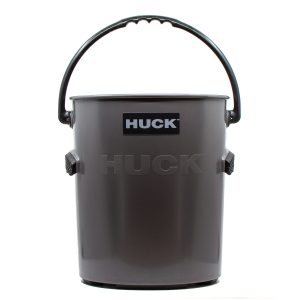 Charcoal bucket with black handle, black side grips, and black feet.